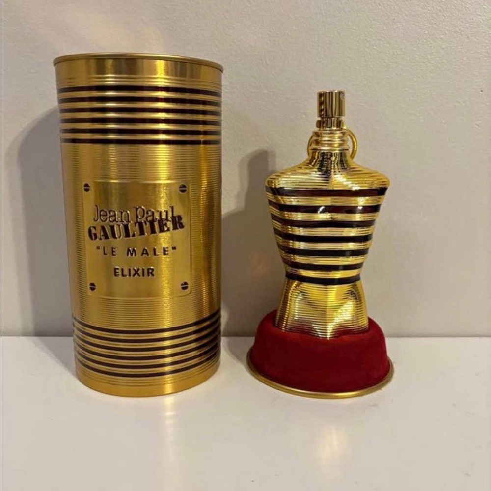 Jean Paul Gaultier Gold and Black Striped Elixir Bottle